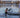 A man coming out of the water after an icy plunge