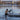 A man coming out of the water after an icy plunge